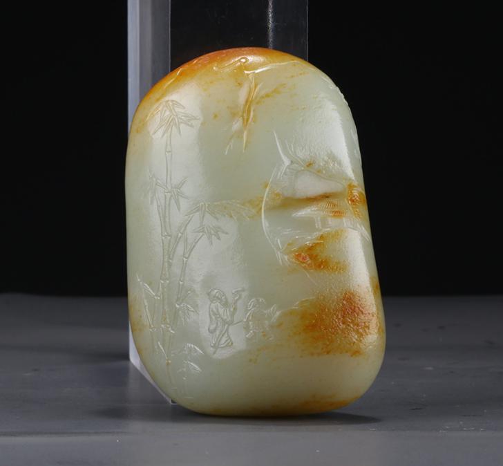 A HETIAN RAW JADE ORNAMENT. (1 of 9)