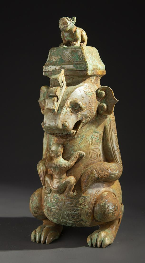 AN ANTIQUE JADE BEAST-KNOB BOTTLE WITH LID. (1 of 10)