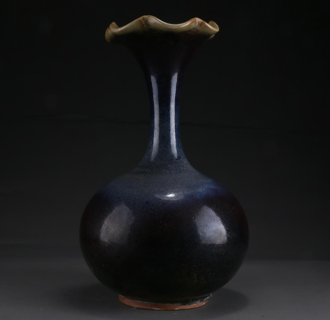 A LONG-NECK PORCELAIN BOTTLE, JUN KILN. (1 of 7)