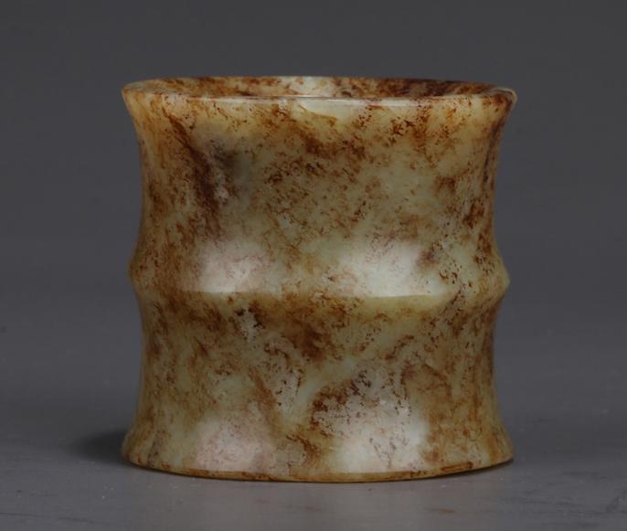 AN ANTIQUE JADE CYLINDRICAL IMPLEMENT. (1 of 7)