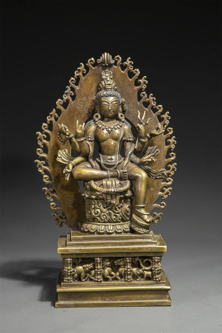 A TIBETAN ALLOY BRONZE SIX-ARM BUDDHA STATUE. (1 of 9)