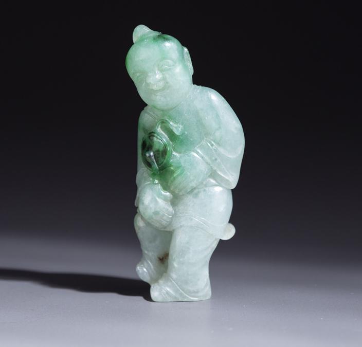 A JADEITE BOY CARVING PENDANT. (1 of 8)