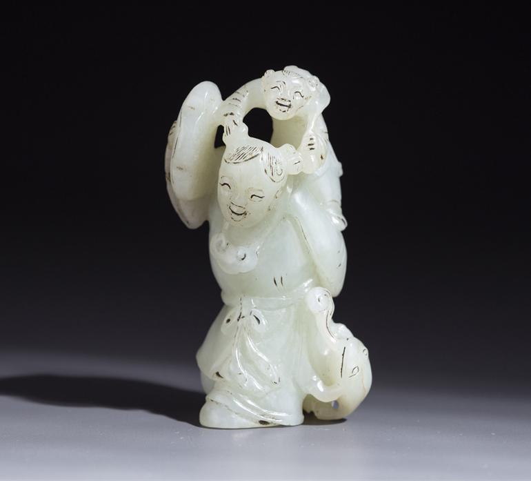 A HETIAN JADE FIGURE CARVING ORNAMENT. (1 of 9)