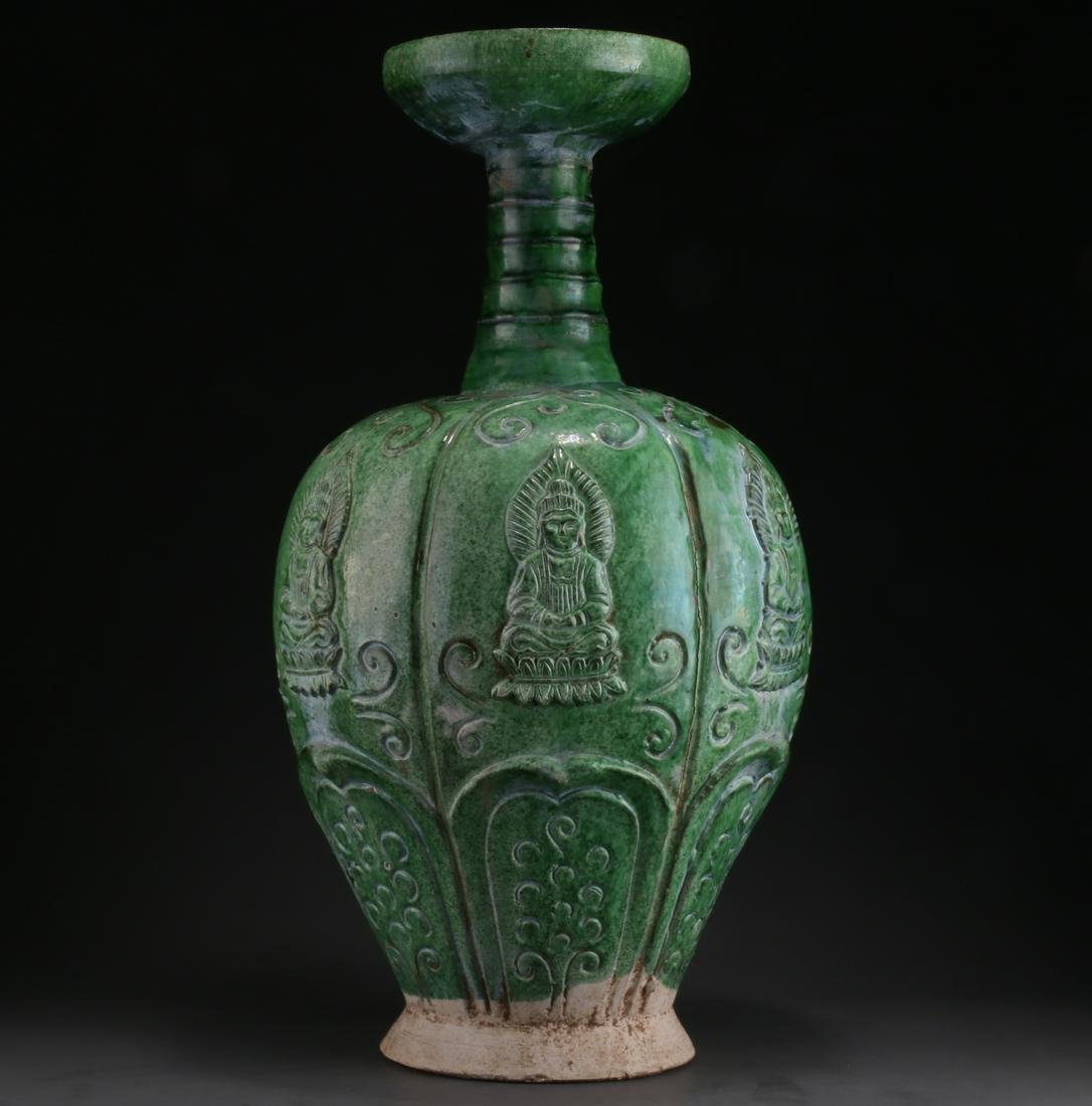 A GREEN GLAZED PORCELAIN BOTTLE. (1 of 8)