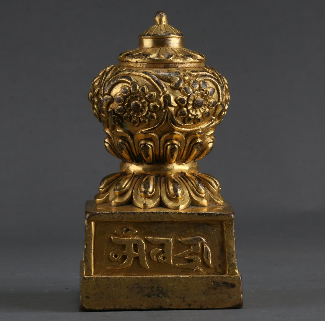 A GILT BRONZE SEAL. (1 of 10)