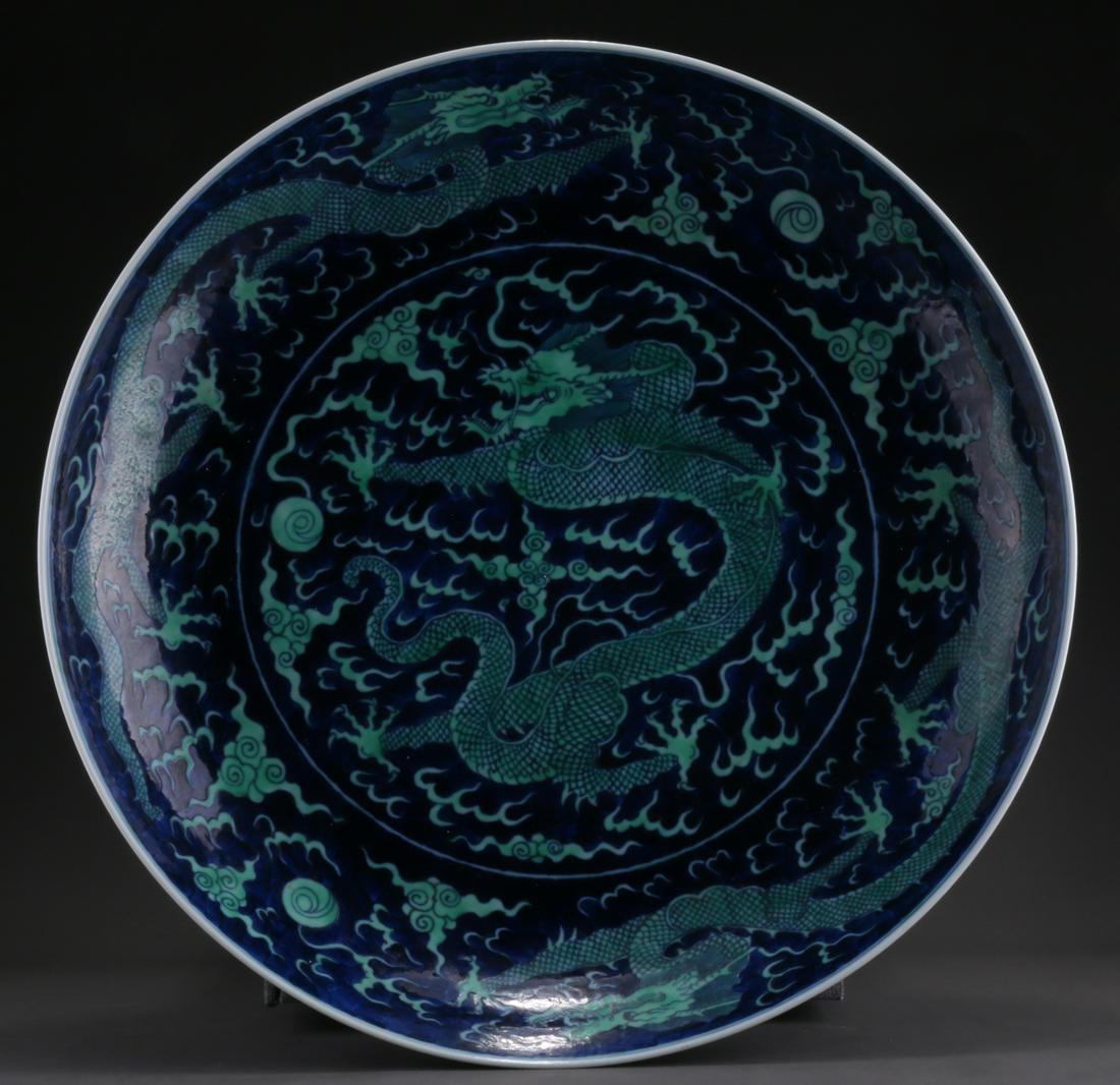 A PORCELAIN PLATE WITH GREEN DRAGON DESIGN. (1 of 10)
