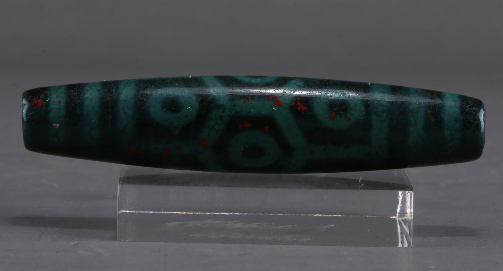 A NINE-EYE AGATE DZI BEAD. (1 of 6)