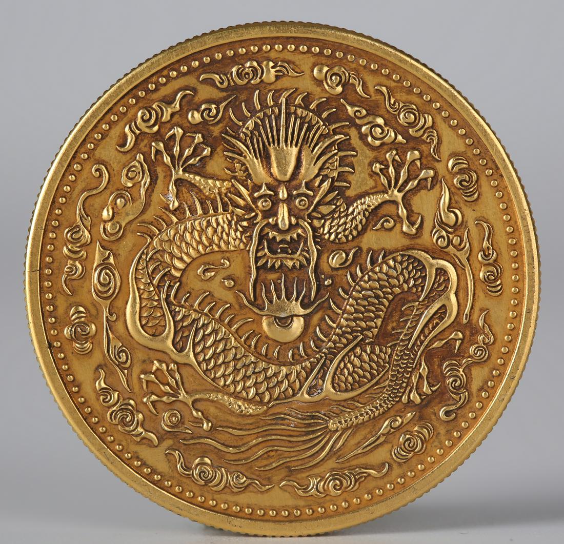 A GOLD COIN, QING DYNASTY. (1 of 4)