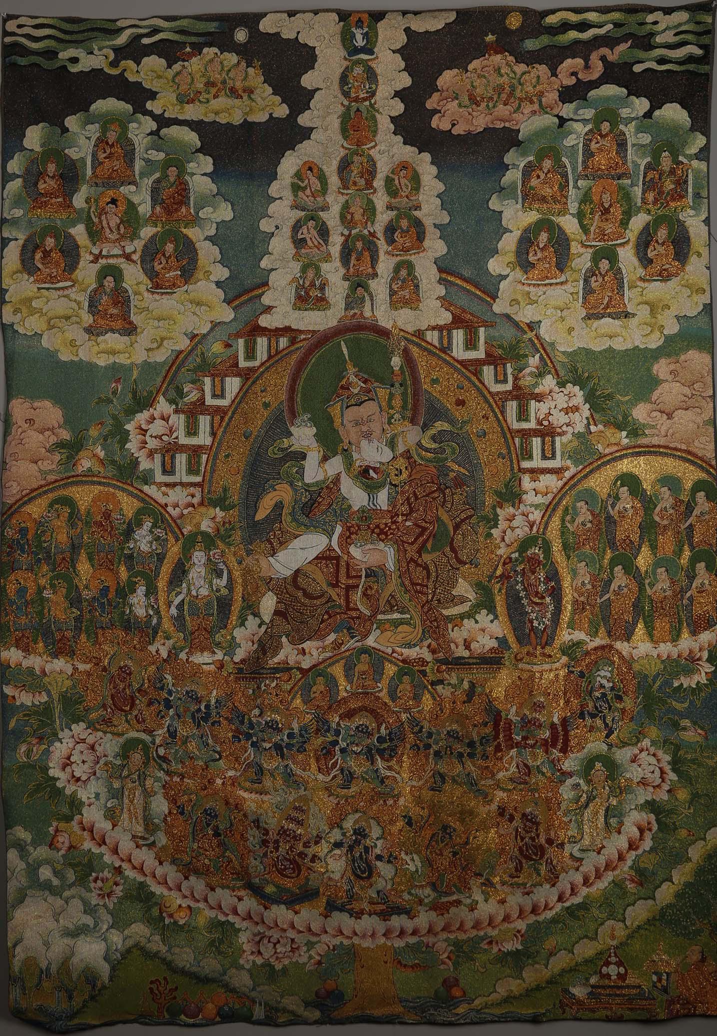 A BROCADE THANGKA OF PADMASAMBHAVA BUDDHA. (1 of 14)