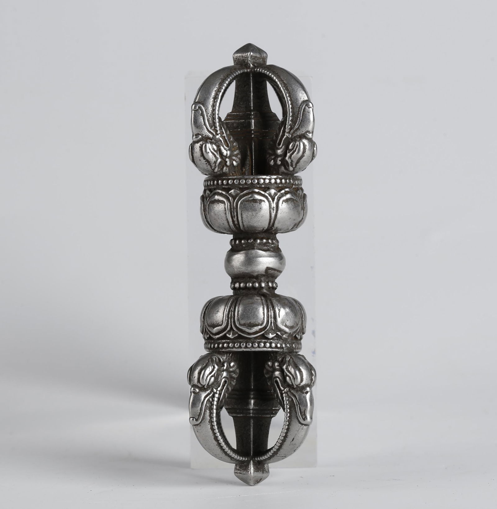 A CAST IRON IMPLEMENT VAJRA PESTLE FOR RITE. (1 of 7)