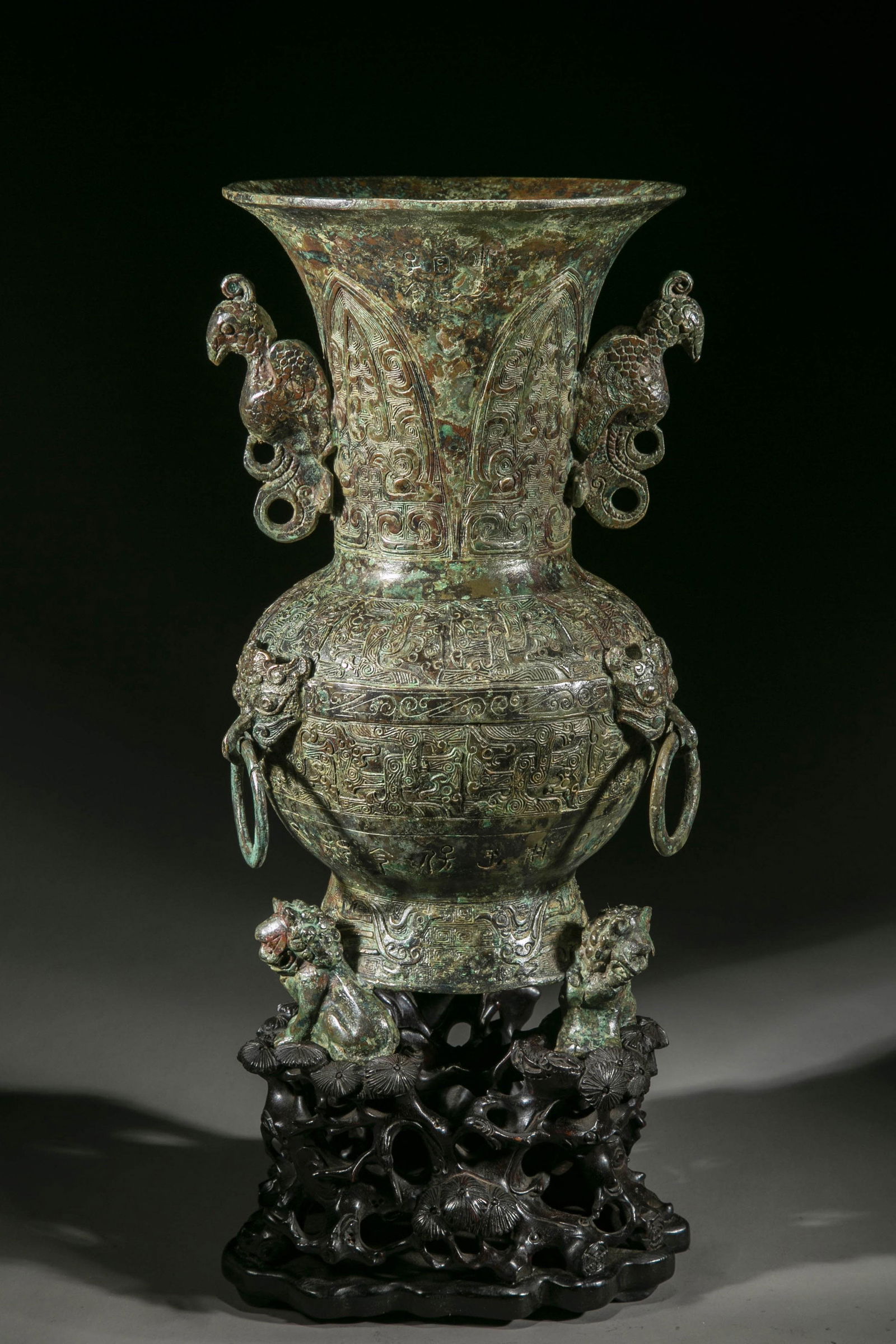 A BRONZE BOTTLE WITH PHOENIX-SHAPED EARS. (1 of 13)