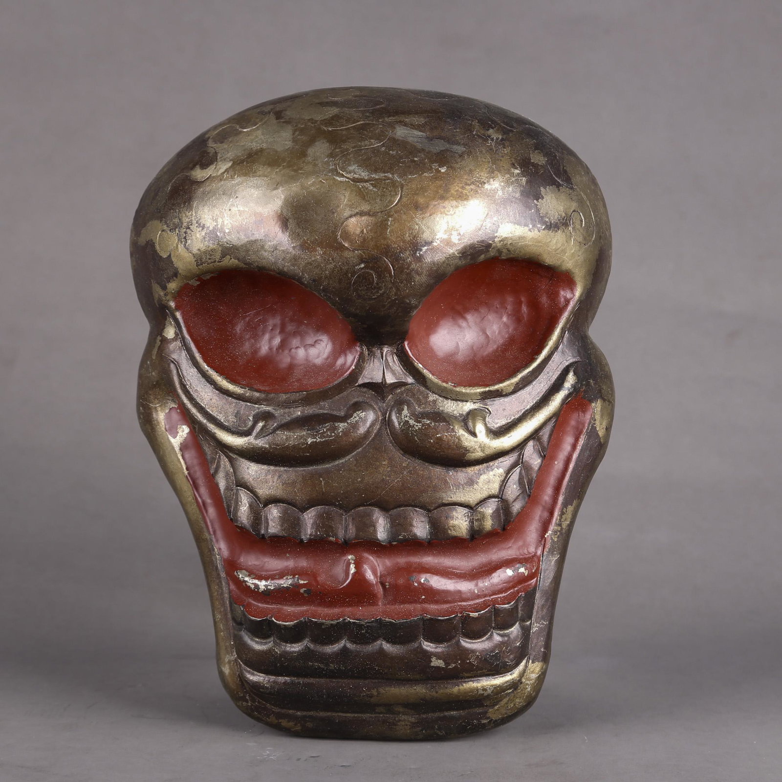 A TIBETAN BRONZE CHITIPATI MASK.: Tibetan Bronze Chitipati Mask.