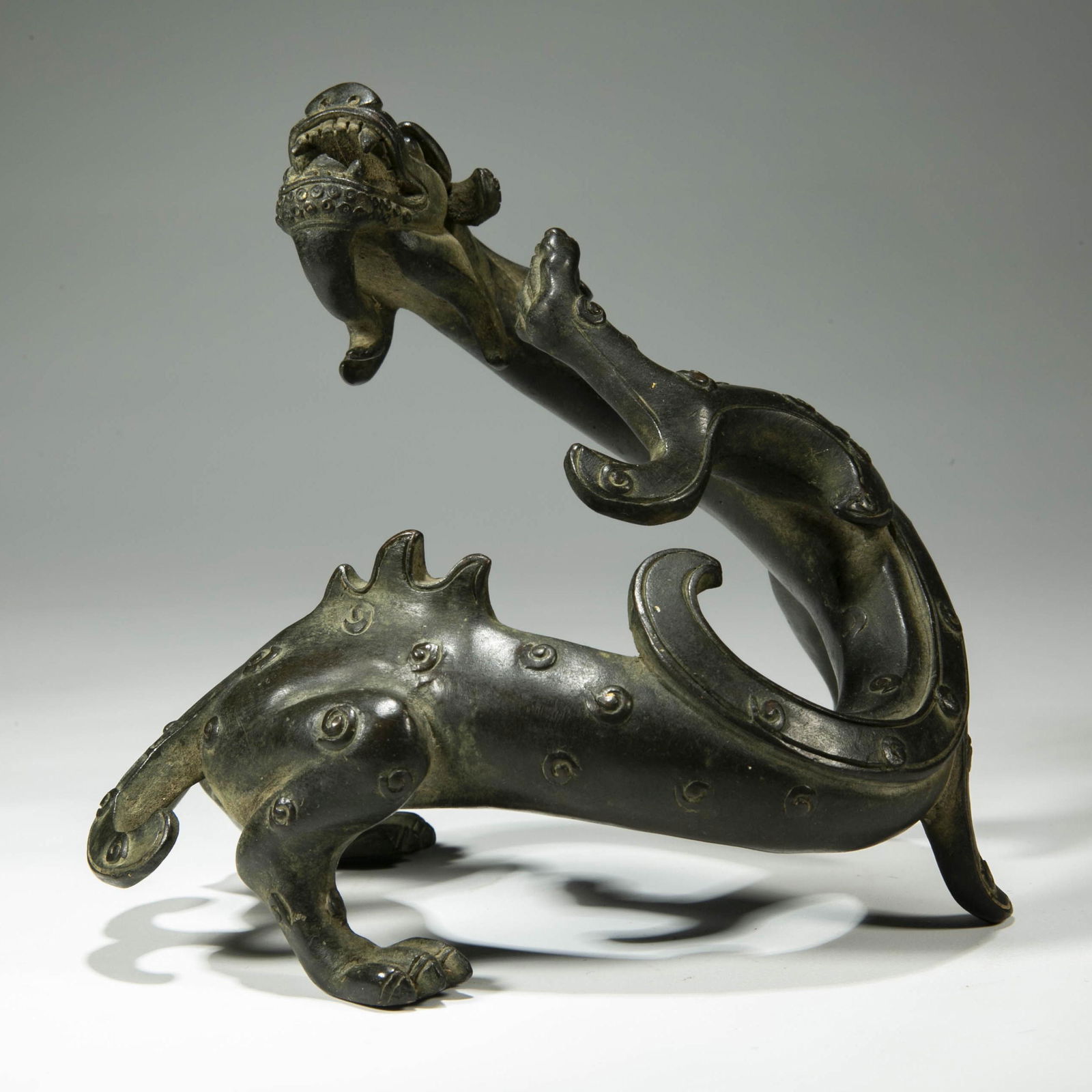A BRONZE DRAGON STATUE ORNAMENT. (1 of 8)