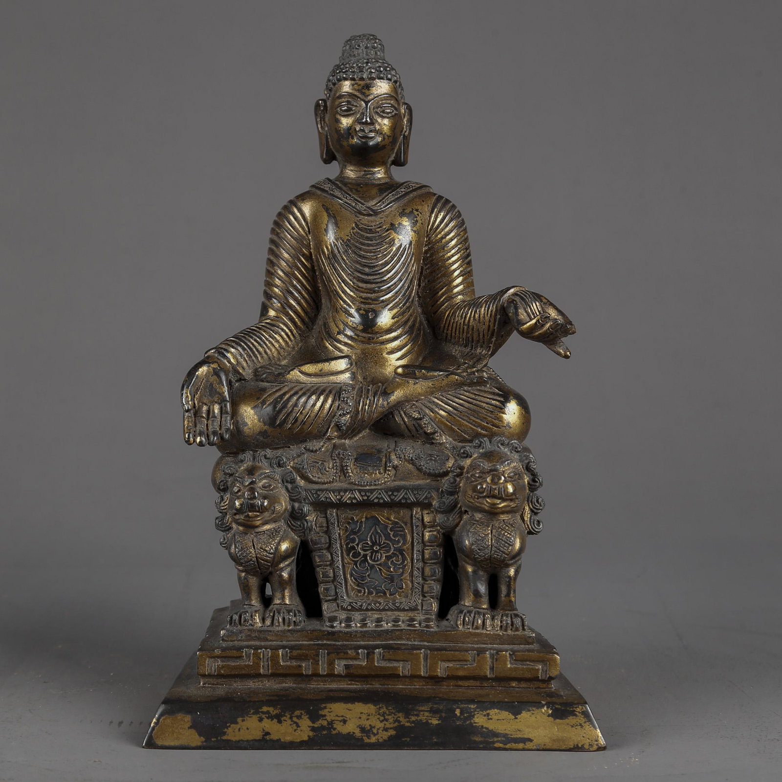 A GILT BRONZE SWAT BUDDHA STATUE. (1 of 9)