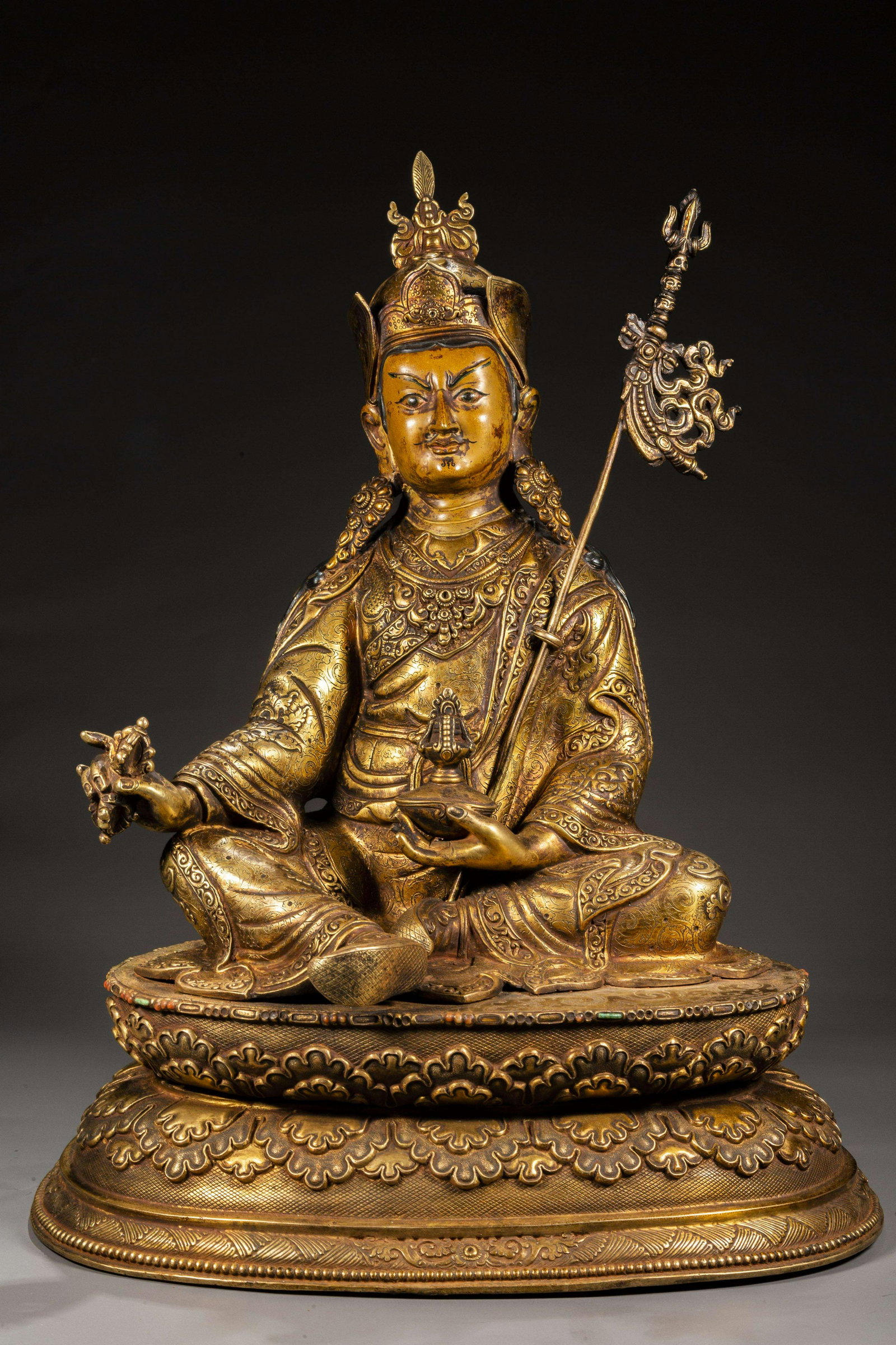 A GILT BRONZE PADMASAMBHAVA BUDDHA STATUE. (1 of 9)