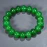 A BEADED JADEITE BRACELET.