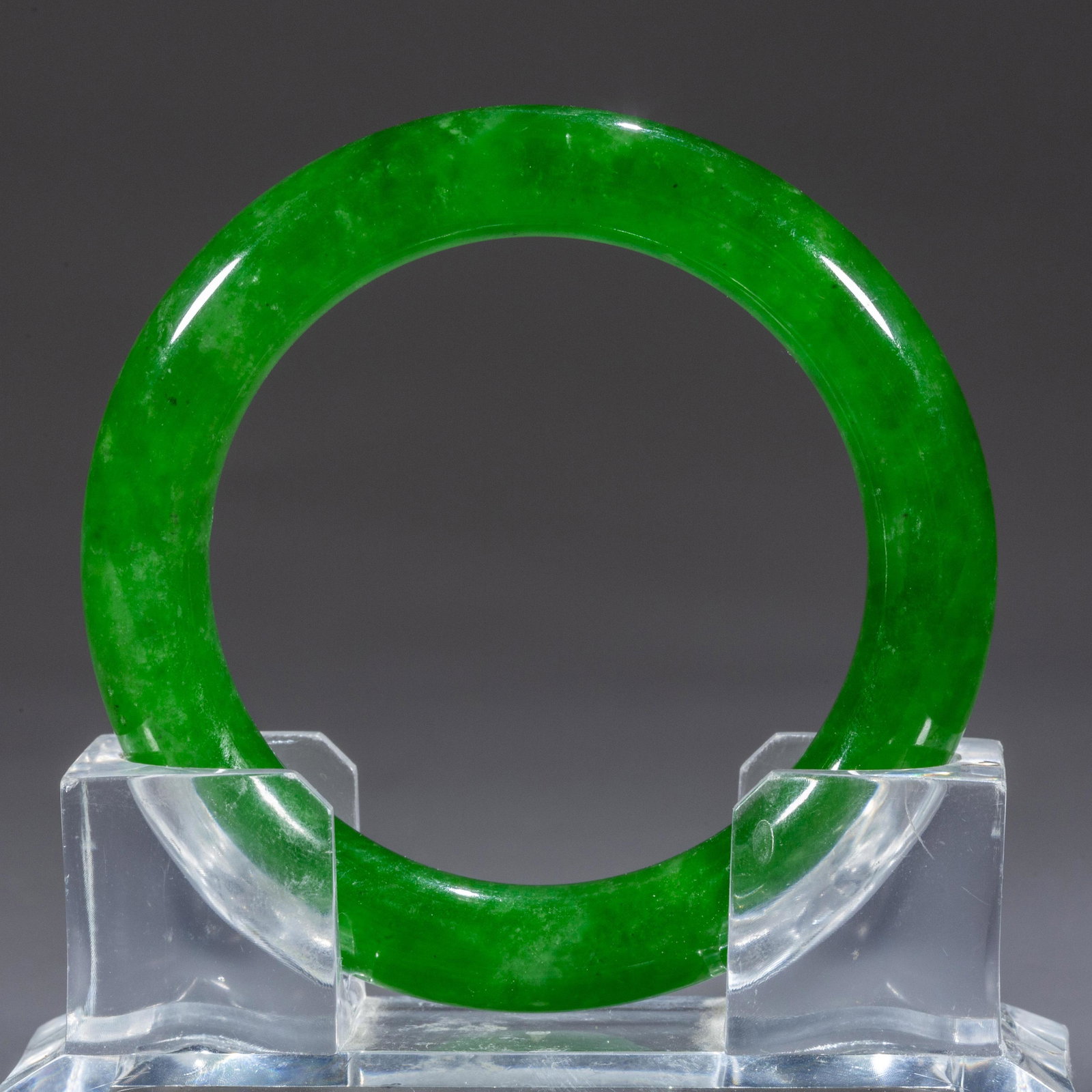 A JADE BANGLE.: Jade Bangle.