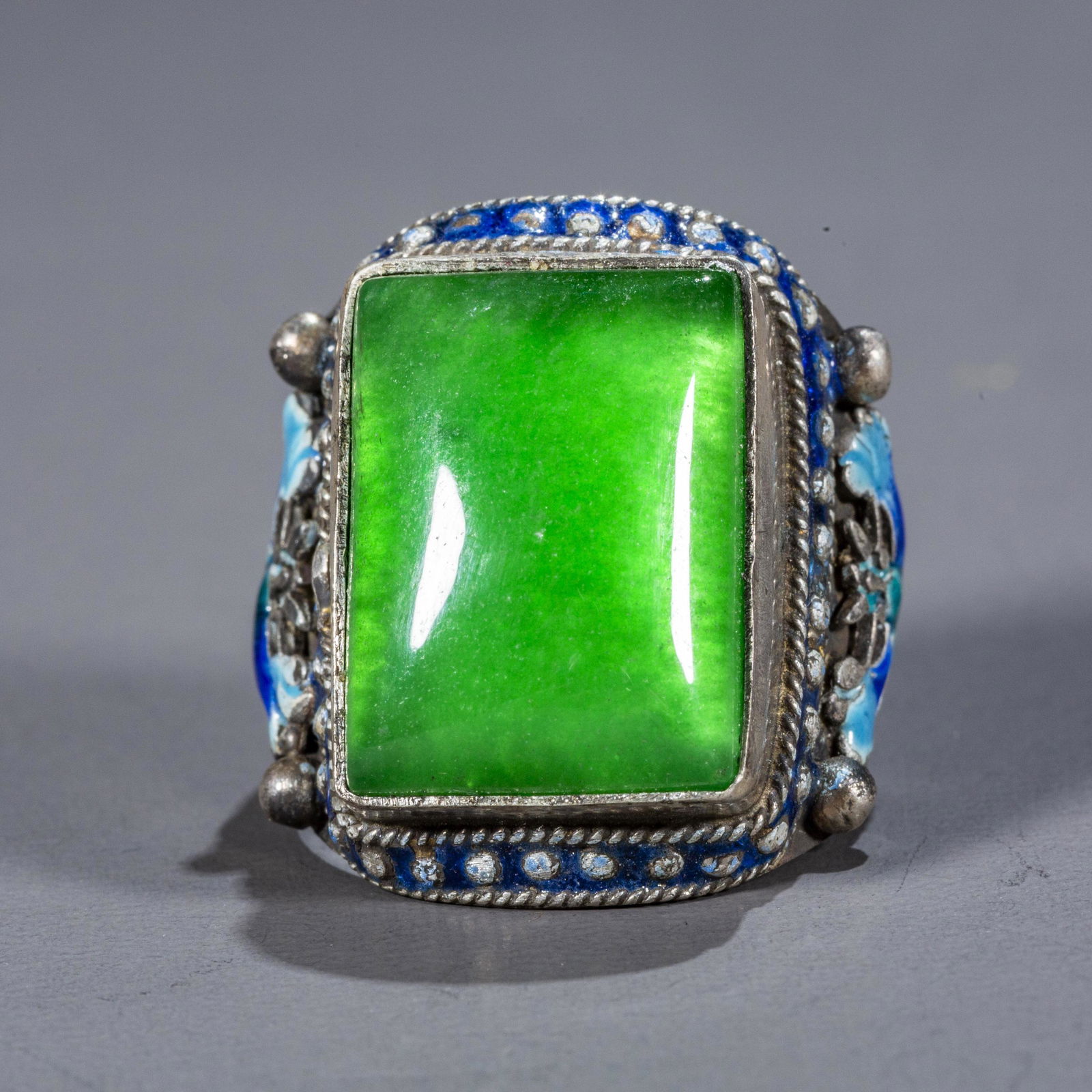 A JADEITE FINGER RING.: Jadeite Finger Ring.