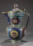 A CLOISONNE ENAMELED MITRAL BRONZE POT.