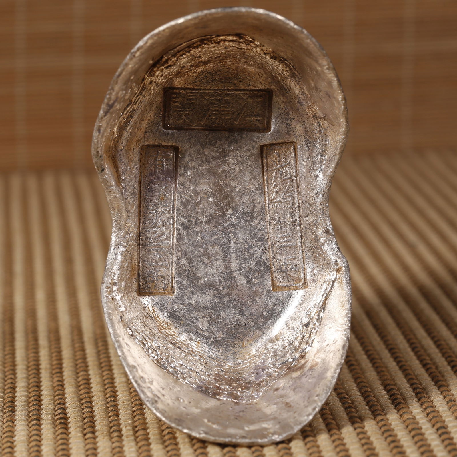 A SHOE-SHAPED SILVER INGOT, FIFTY LIANG. (1 of 6)