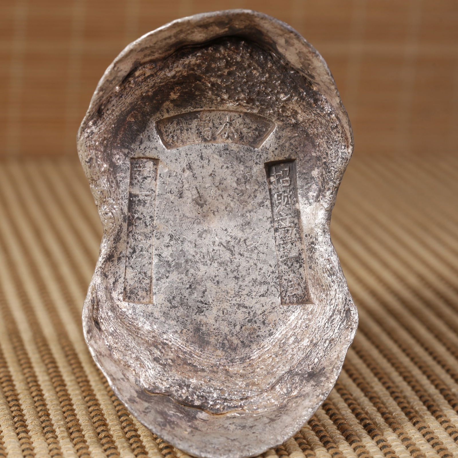 A SHOE-SHAPED SILVER INGOT, FIFTY LIANG. (1 of 7)