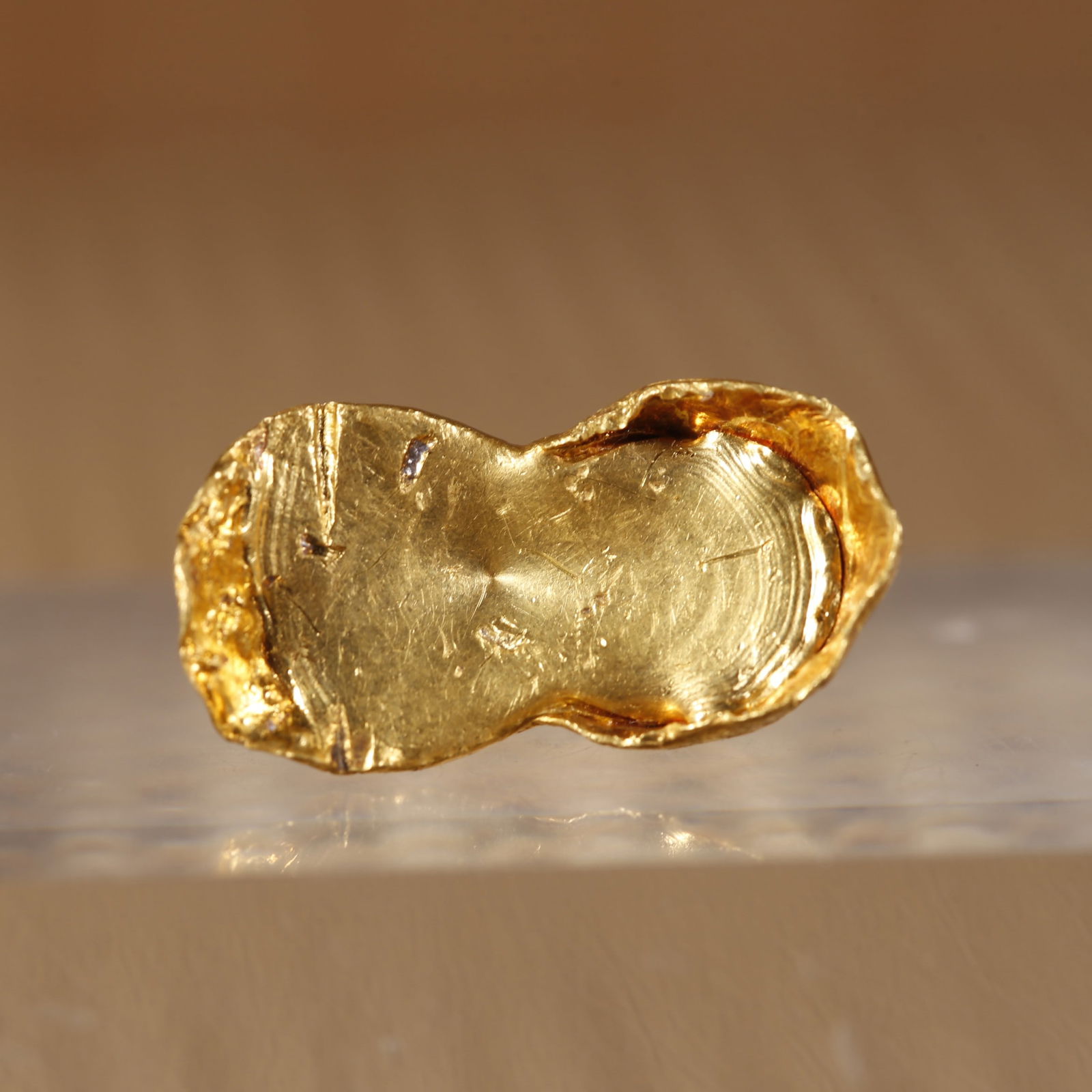 A SHOE-SHAPED GOLD INGOT. (1 of 6)