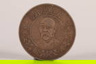 A SILVER DOLLAR COIN