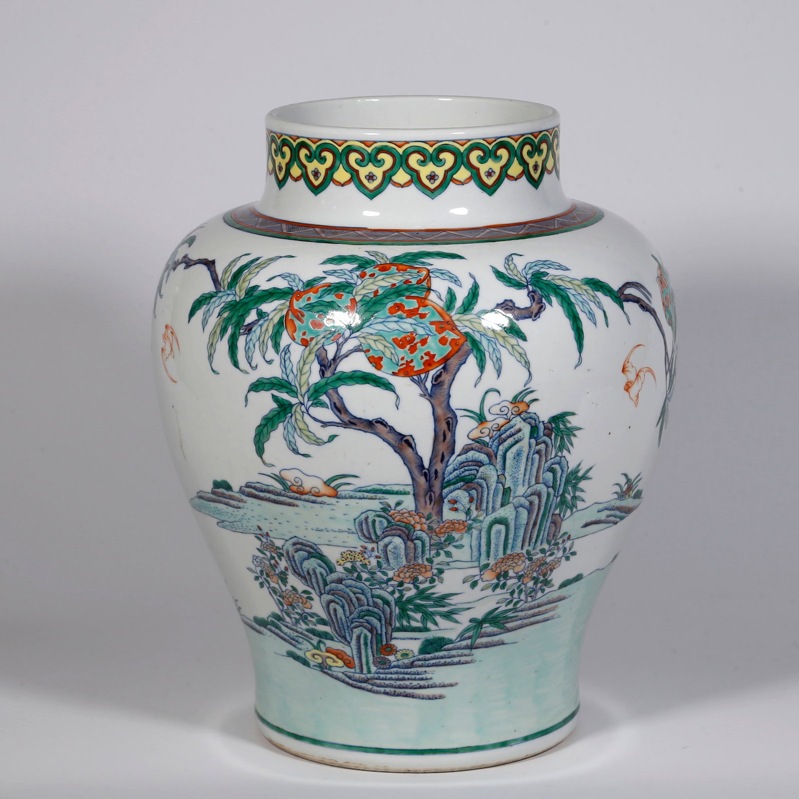 A PORCELAIN JAR, WITH BATS AND PEACHES DESIGN.: Contrasting-Color Porcelain Jar, with Bats and Peaches Design, Symbolize Happiness and Longevity.