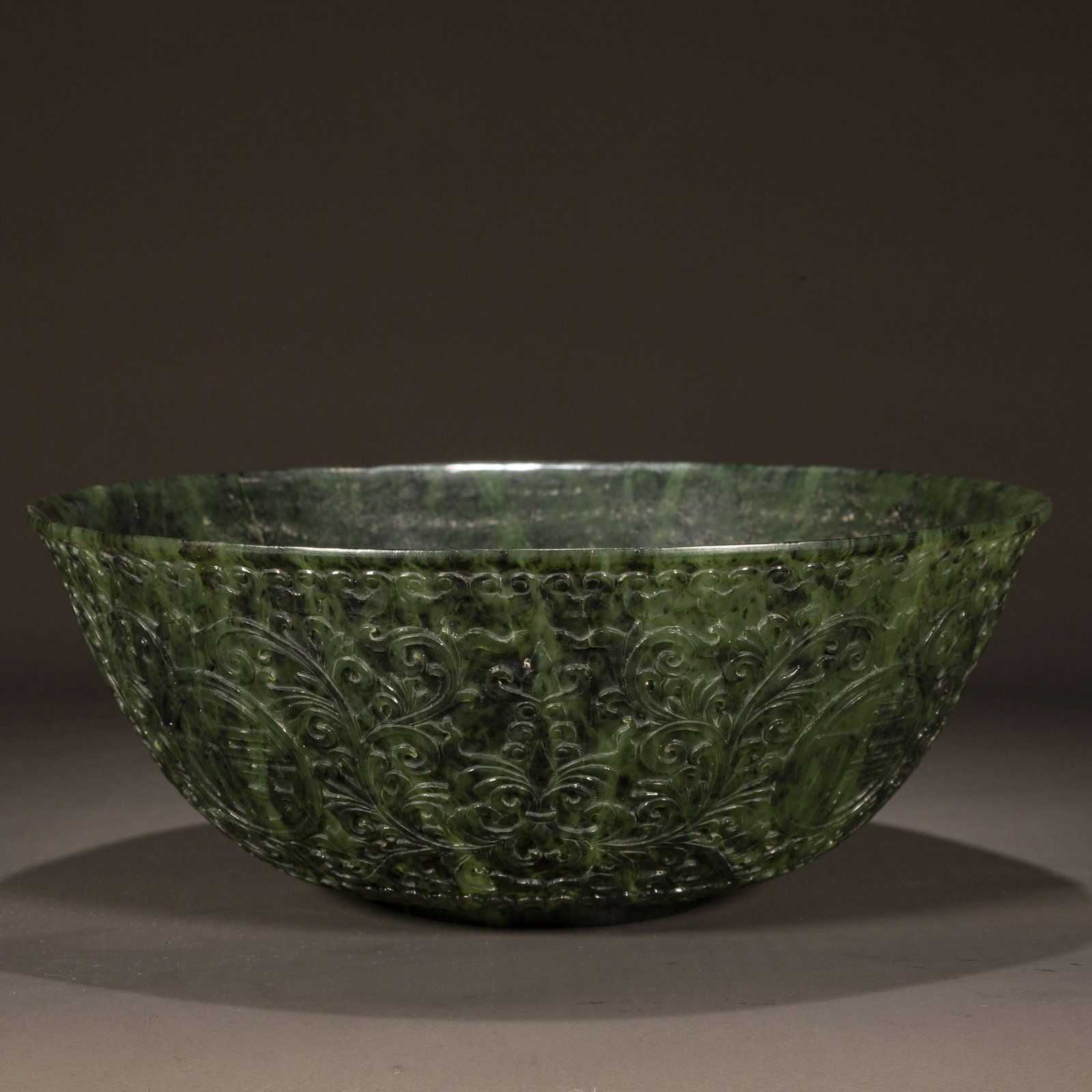 A HETIAN JASPER BIG BOWL, CARVED FLOWERS DESIGN.: Hetian Jasper Big Bowl, Carved Composite Flowers Design.