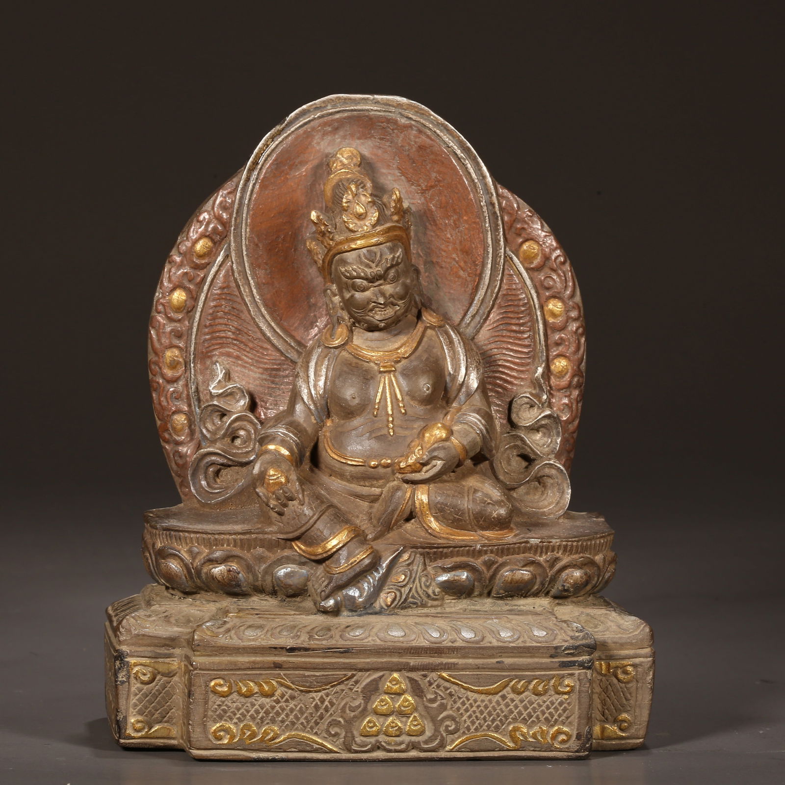 A BLACK STONE GOD OF WEALTH BUDDHA STATUE. (1 of 7)