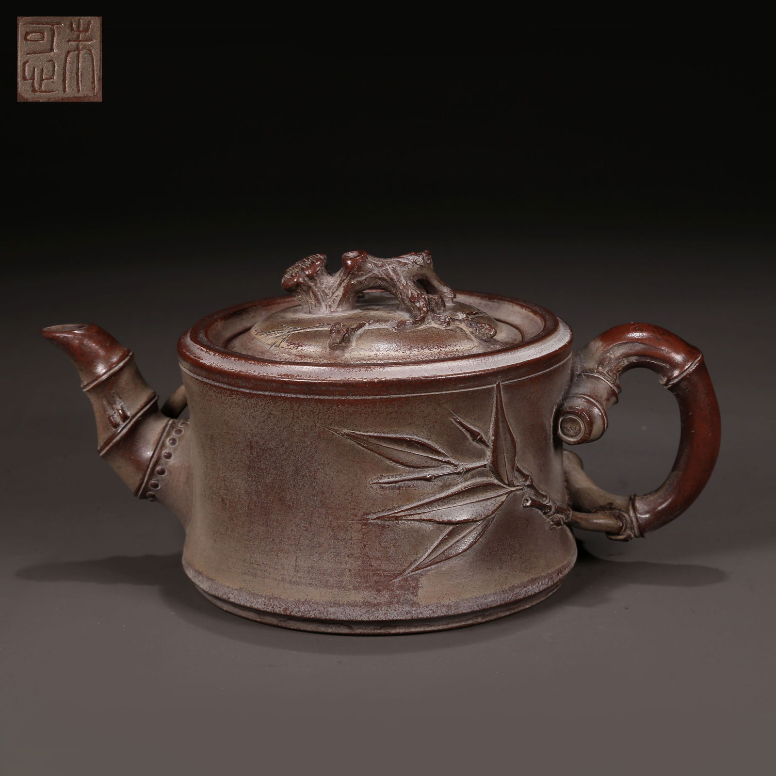 A PURPLE CLAY TEAPOT, WITH BAMBOO DESIGN. (1 of 9)