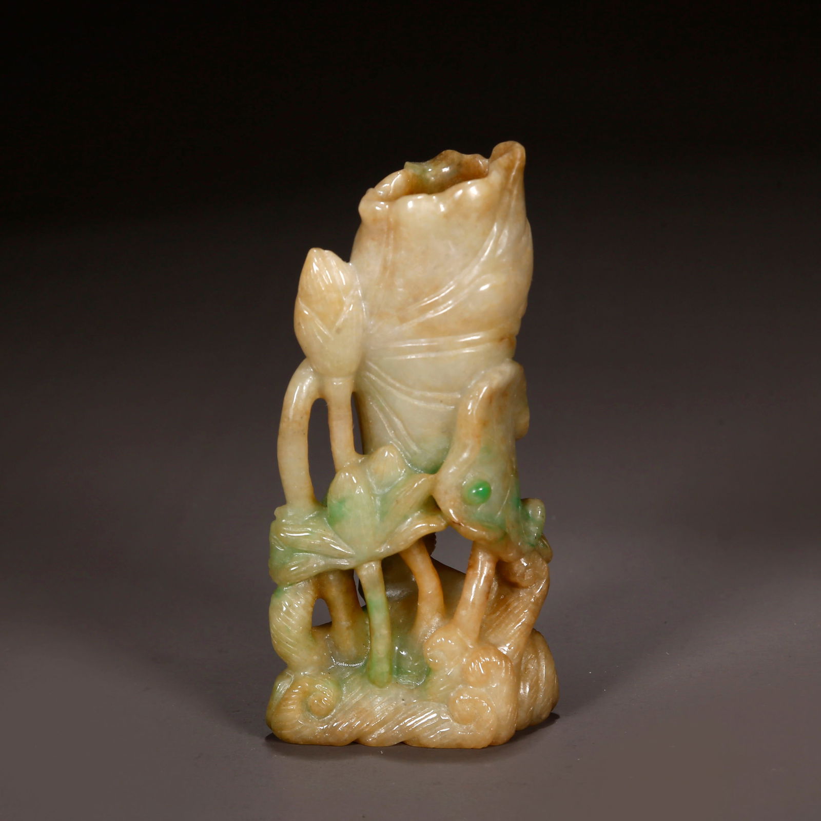 A LOTUS-LEAF-SHAPED JADEITE CUP. (1 of 9)