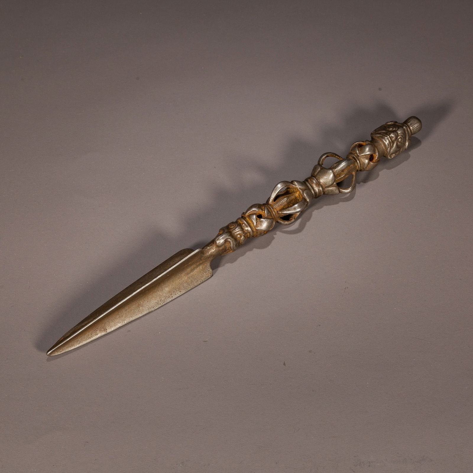 A CAST IRON DHARMA IMPLEMENT VAJRA "JUE". (1 of 8)