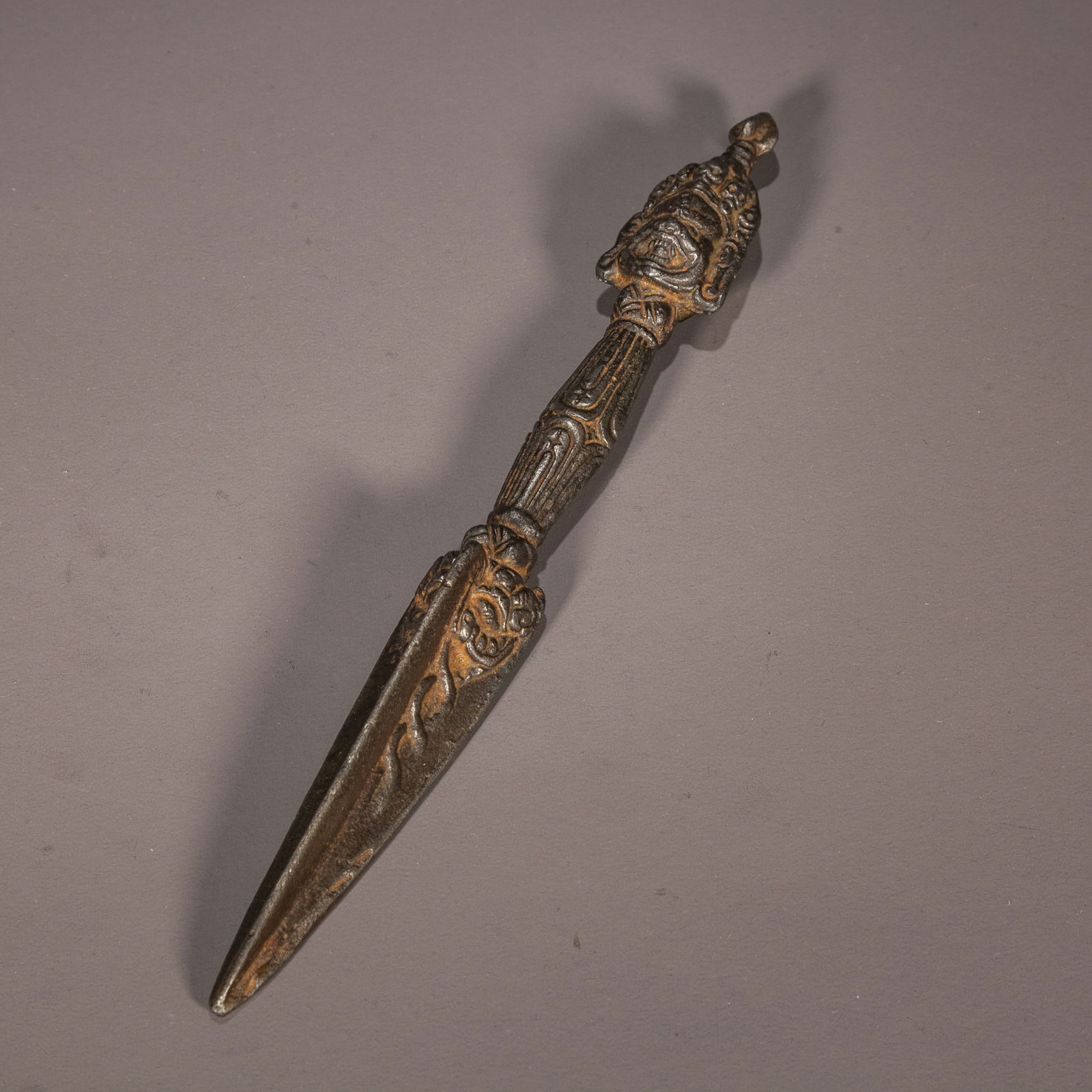A CAST IRON DHARMA IMPLEMENT VAJRA "JUE". (1 of 7)