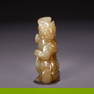 AN ANCIENT JADE AUSPICIOUS BEAST CARVING.