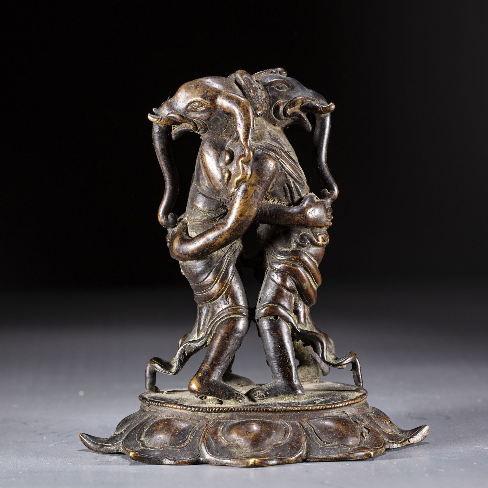 A BRONZE ELEPHANT-FACE MANDKESVARA STATUE. (1 of 9)