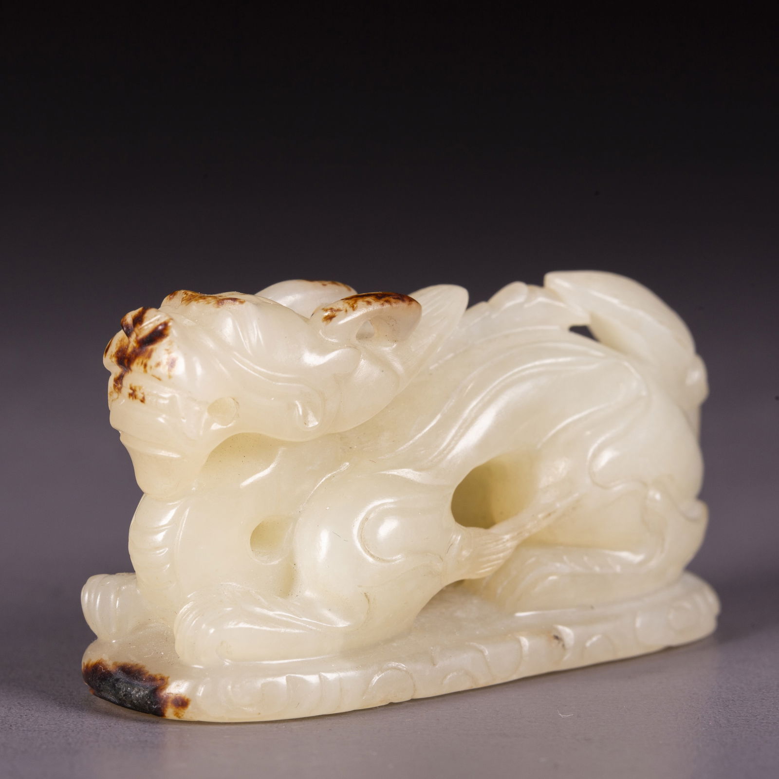 A HETIAN JADE DRAGON CARVING. (1 of 6)