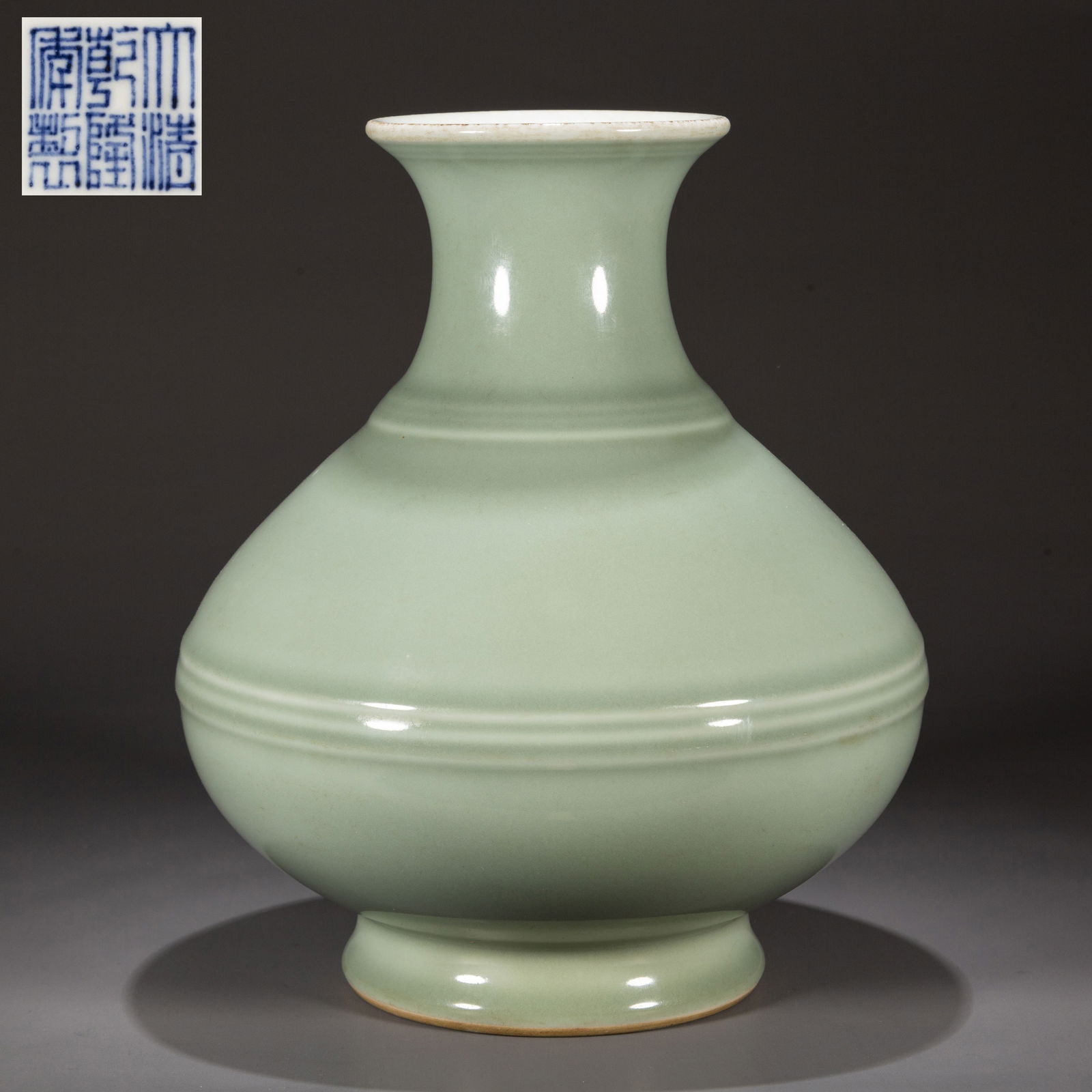 A LIGHT GREEN GLAZED PORCELAIN BOTTLE. (1 of 6)