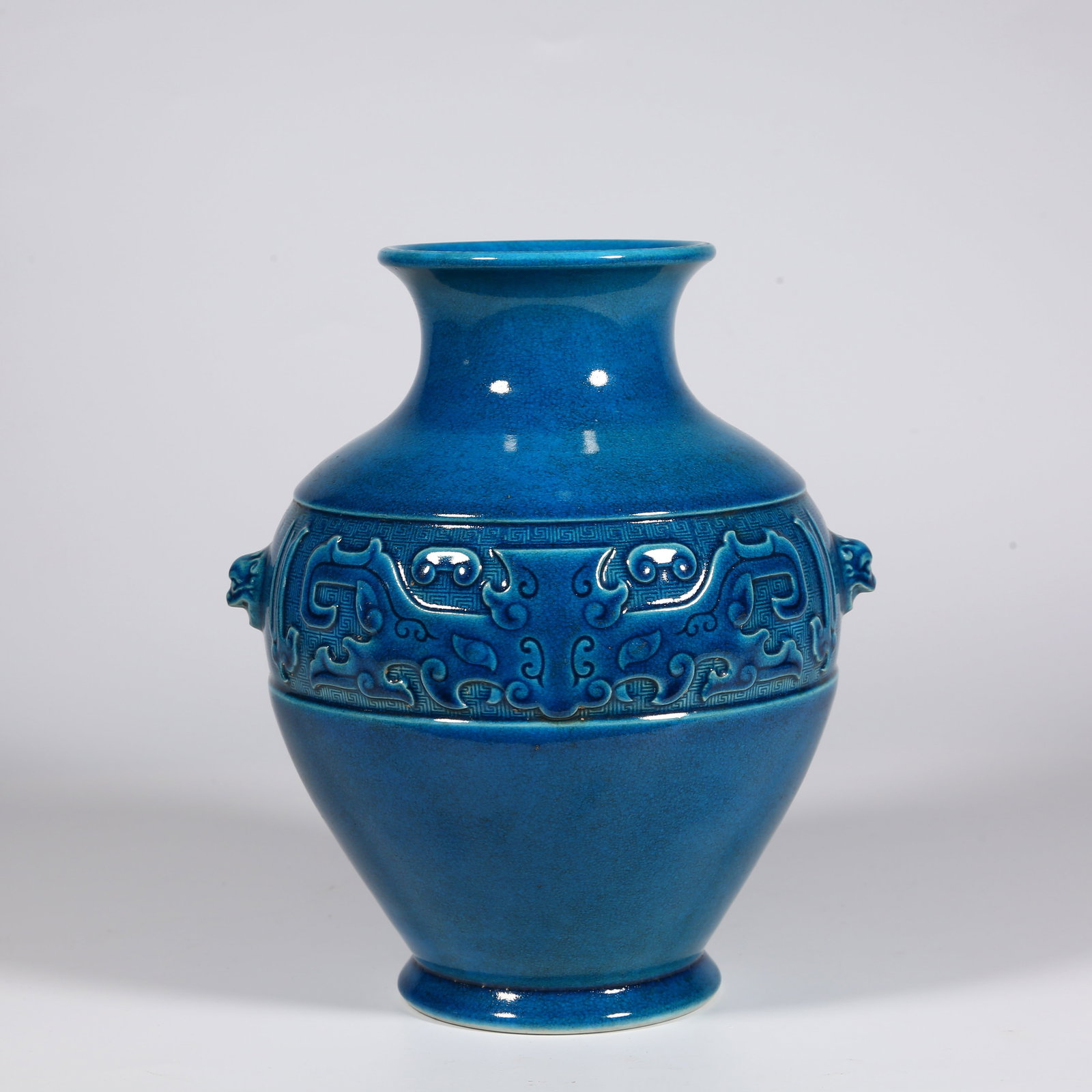 A PEACOCK-BLUE GLAZED PORCELAIN BOTTLE. (1 of 8)