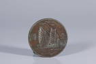 A SILVER DOLLAR COIN
