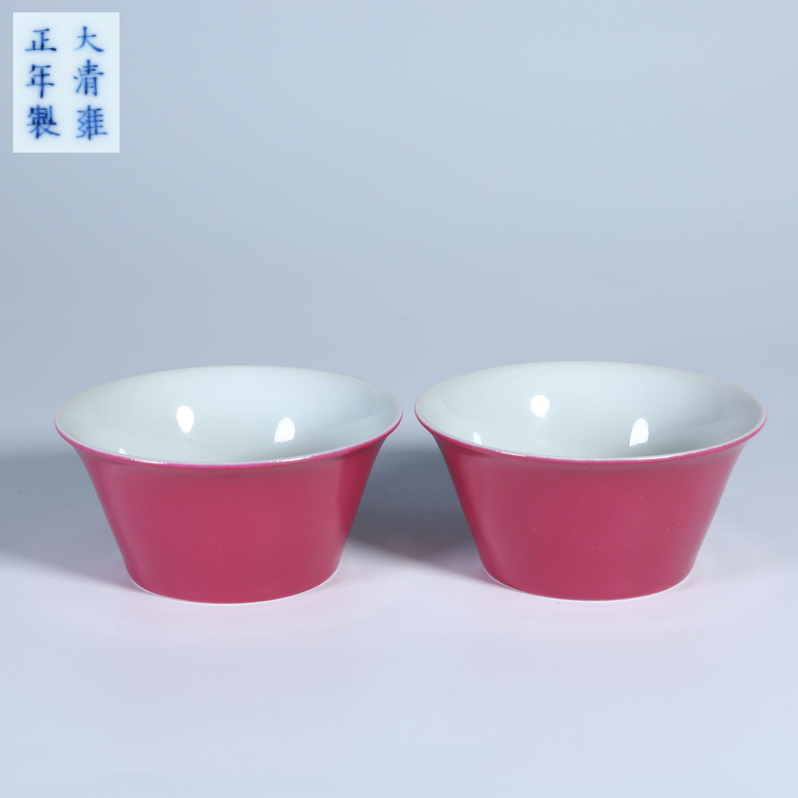 A SET OF ROUGE RED-GLAZED HORSE HOOF CUPS: Set of Rouge Red-Glazed Horse Hoof Cups