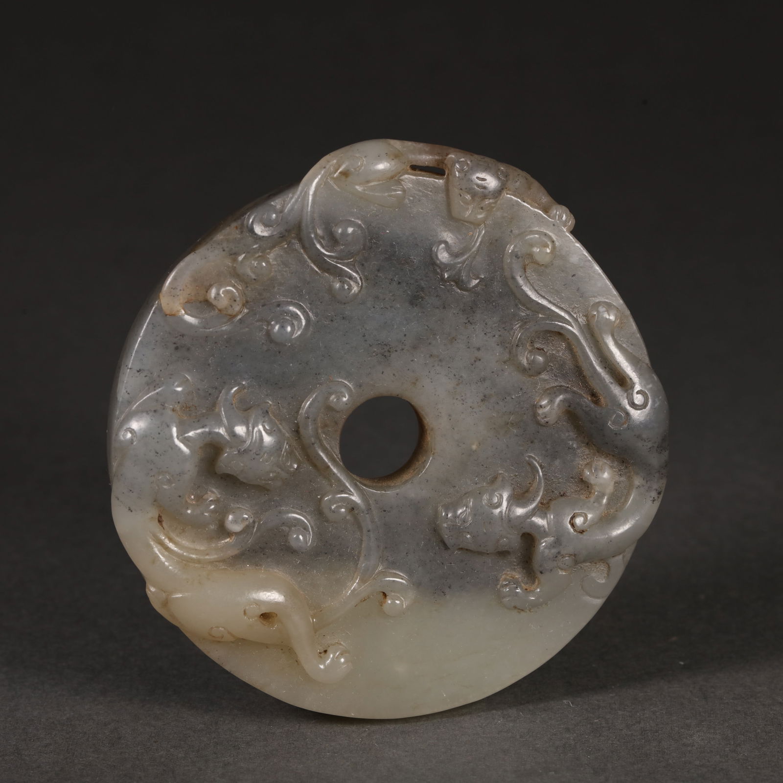 A HETIAN JADE CHI DRAGON BI-DISK (1 of 9)