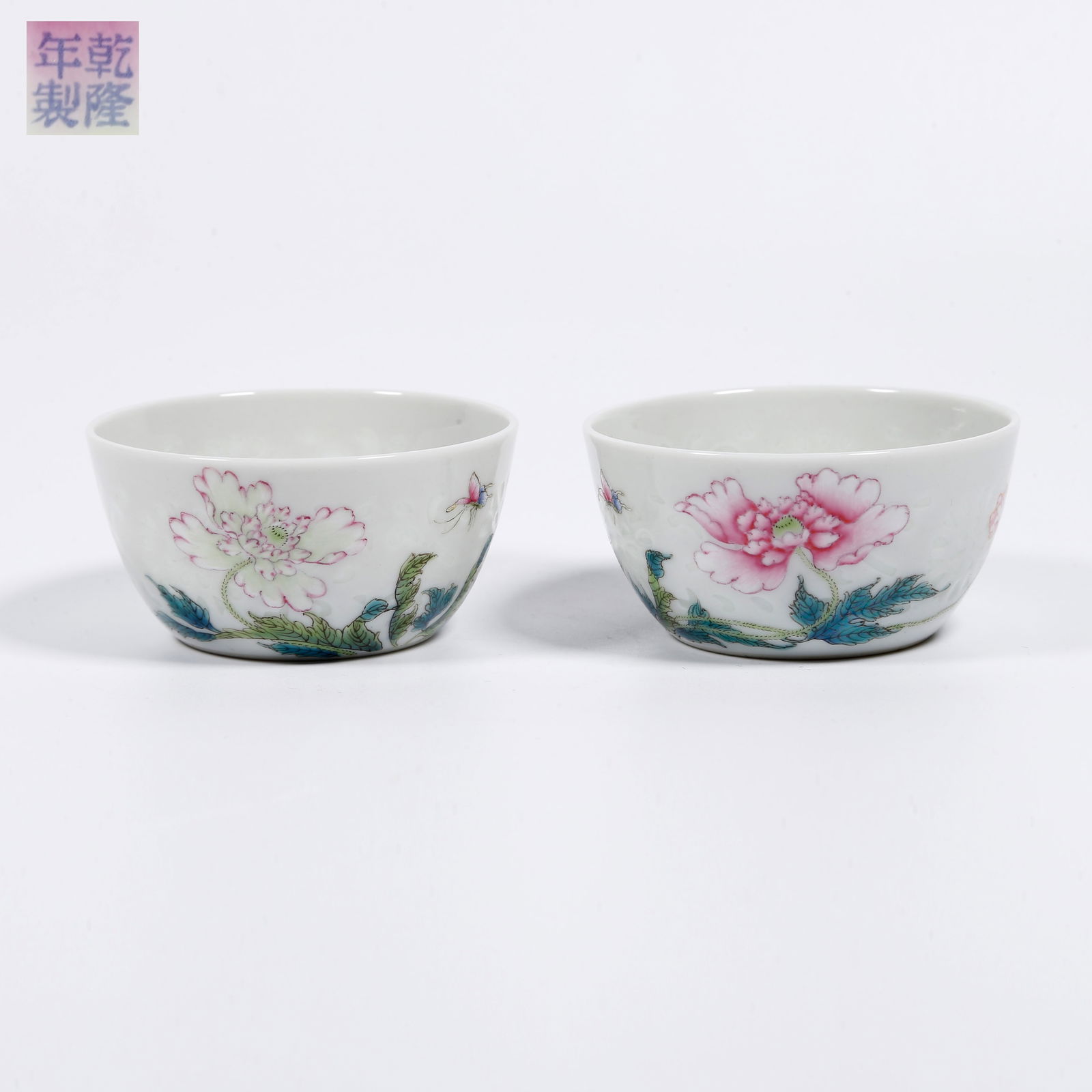 A FAMILLE ROSE FLORAL PATTERN TEACUP PAIR (1 of 7)