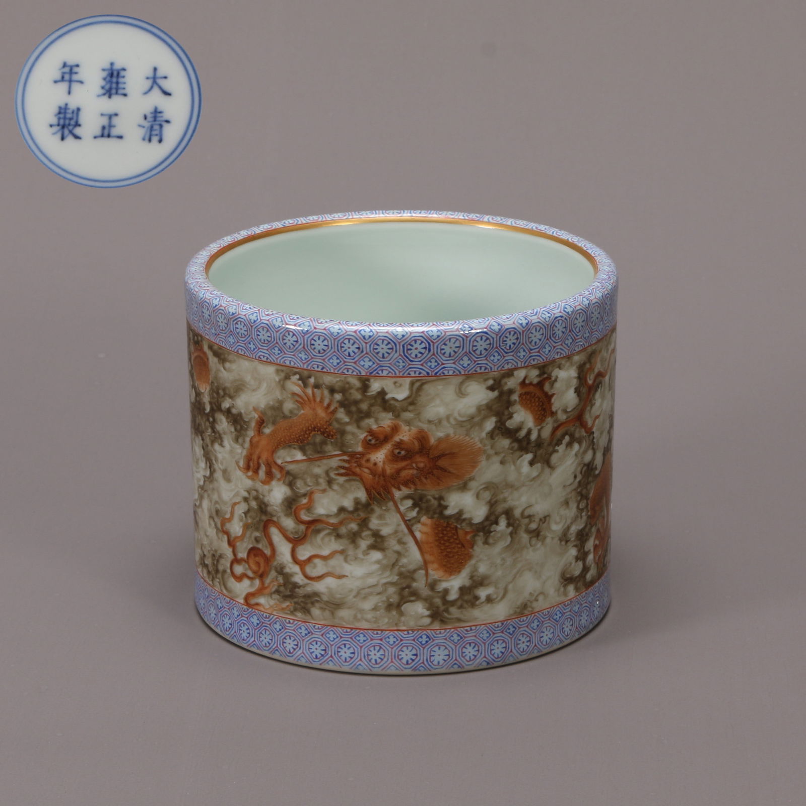 A UNDERGLAZE RED BRUSH POT WITH CLOUD AND DRAGON MOTIF (1 of 9)