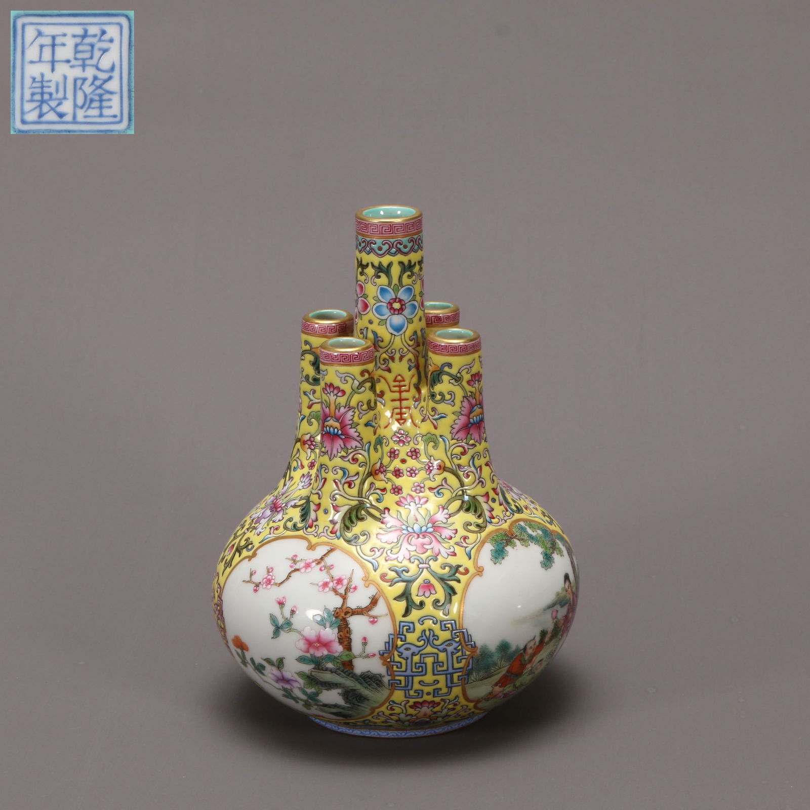 A FAMILLE ROSE ENAMELLED FIVE-TUBE VASE WITH FIGURATIVE STORY IN OPEN PANELS (1 of 9)