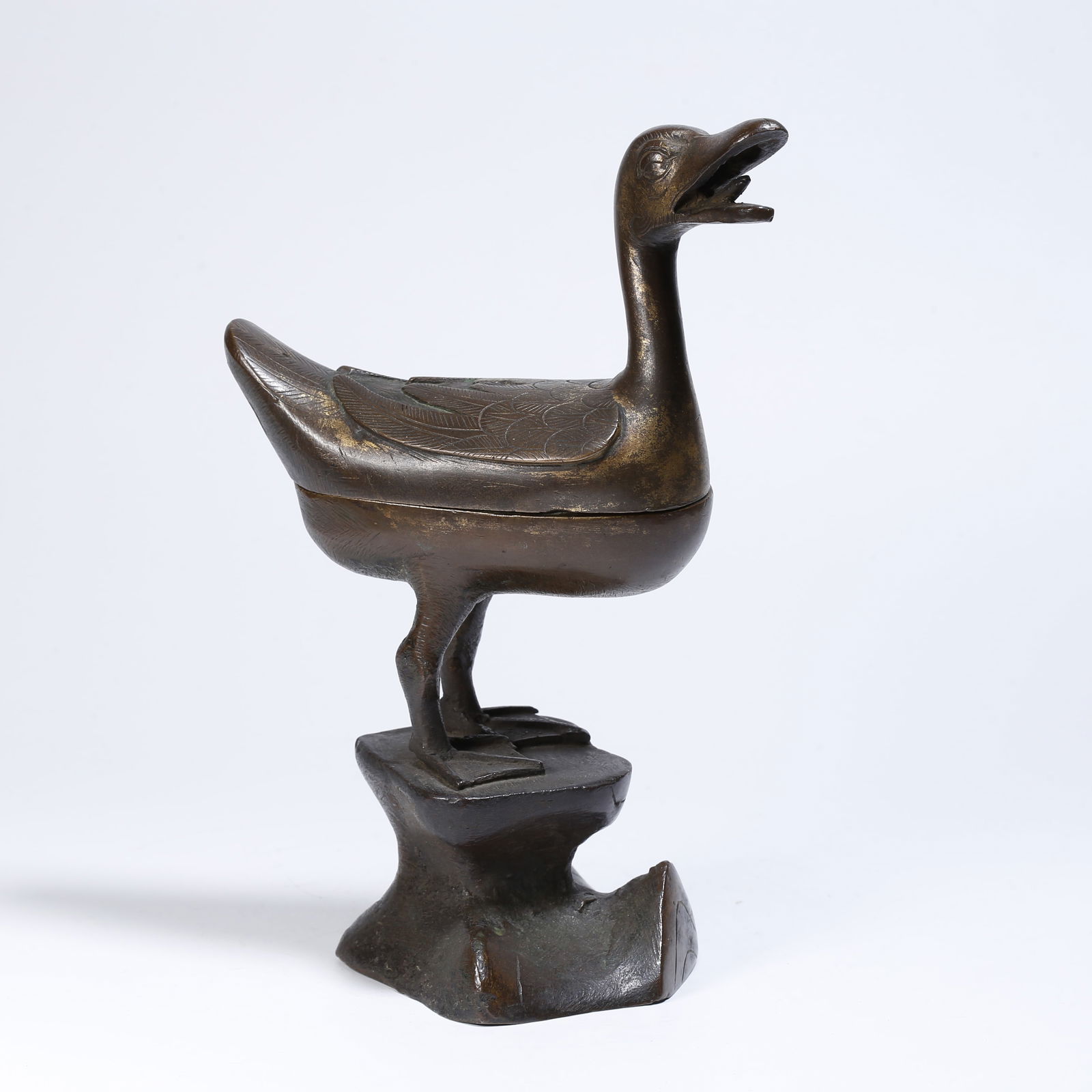 A BRONZE INCENSE BURNER IN THE SHAPE OF AN AUSPICIOUS BEAST (1 of 9)