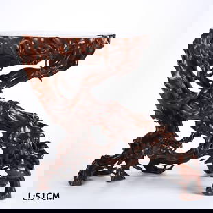A HUANGHUALI ROOT CARVED FLOWER STAND: Huanghuali Root Carved Flower Stand