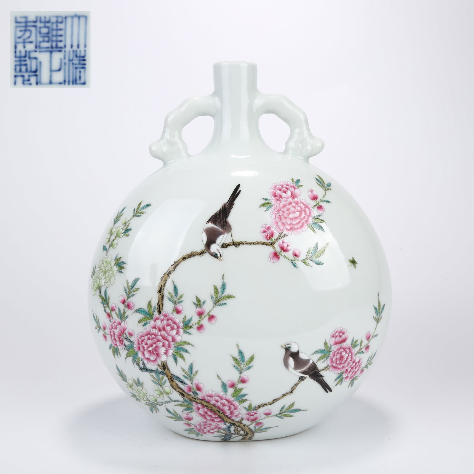 A FAMILLE ROSE MOON FLASK WITH BIRD AND FLOWER DESIGN: Famille rose moon flask with bird and flower design