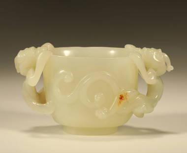 A HETIAN JADE CUP WITH CHI DRAGON HANDLES: Hetian Jade Cup with Chi Dragon Handles