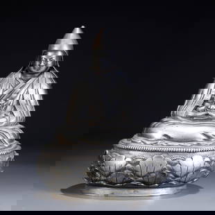 A SILVER GURU STATUE: Silver Guru Statue